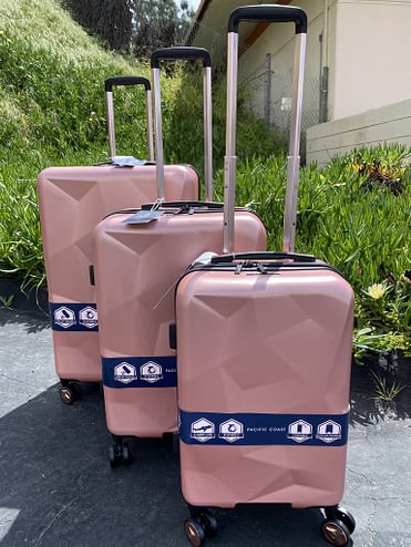 gold hardside luggage